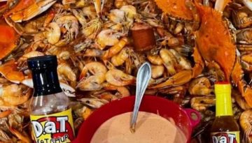 Photo of Cajun seafood boil with dip and dat sauce and dat ketchup